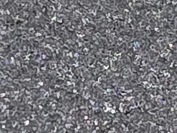 Abrasive blast media close-up at SIC facility